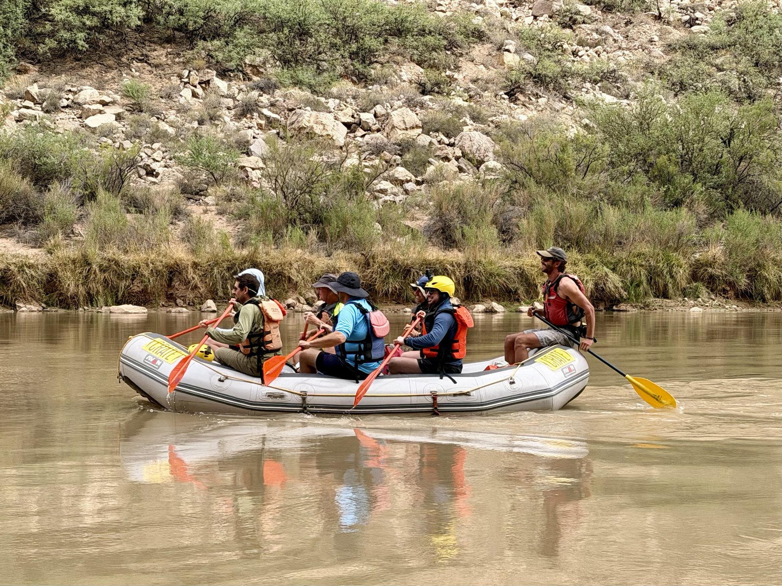 A raft on the Colorado River in the Grand Canyon at low water